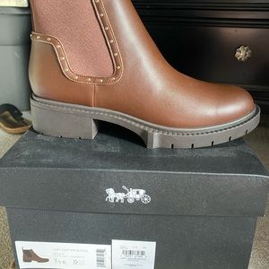 Brown coach boots